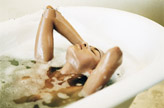 Woman taking sole bath